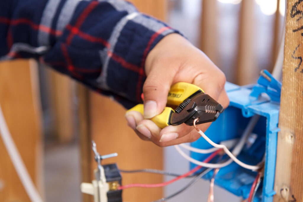 RSI student working on electrical wiring