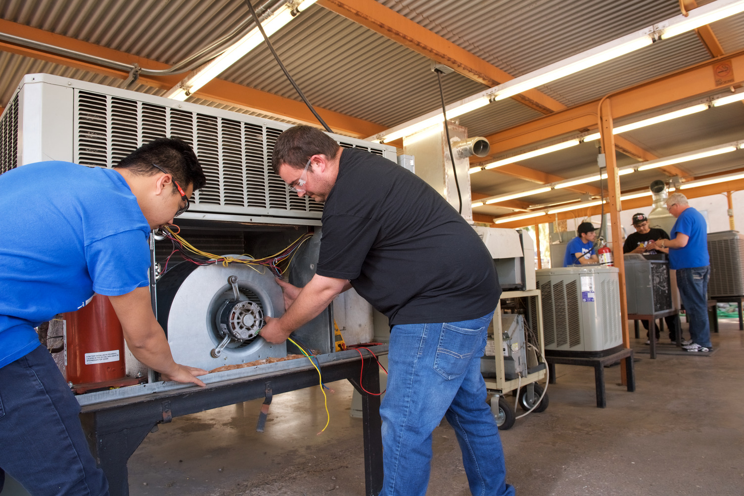 TWO students in HVAC training at RSI