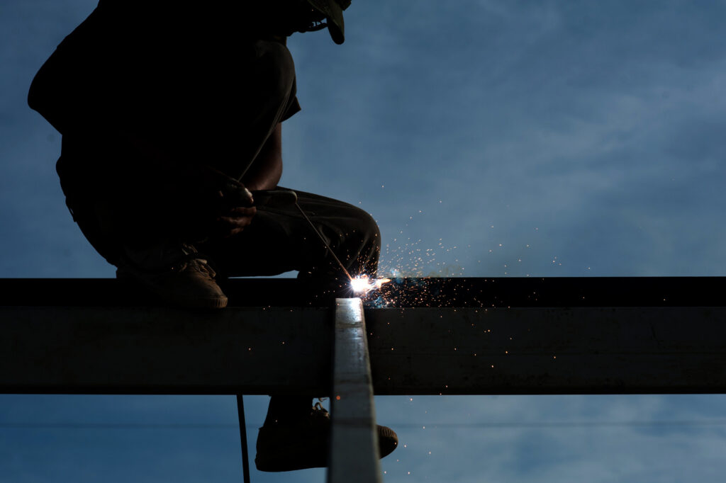 Welder in field