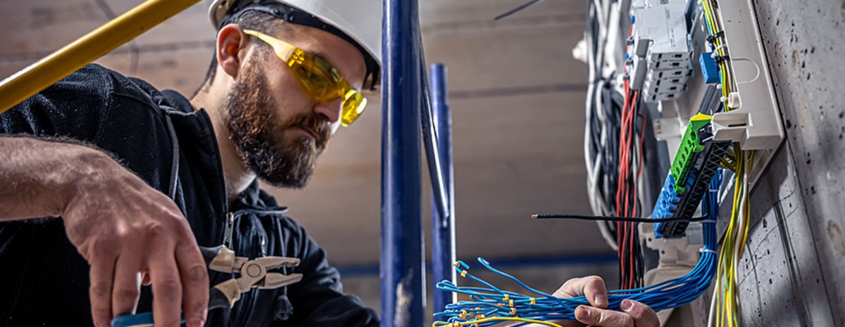 electrician fixing switchboard