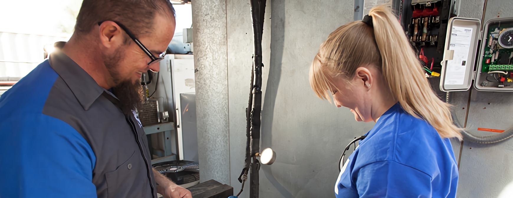 female working in hvac