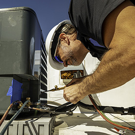 hvac tech hard at work