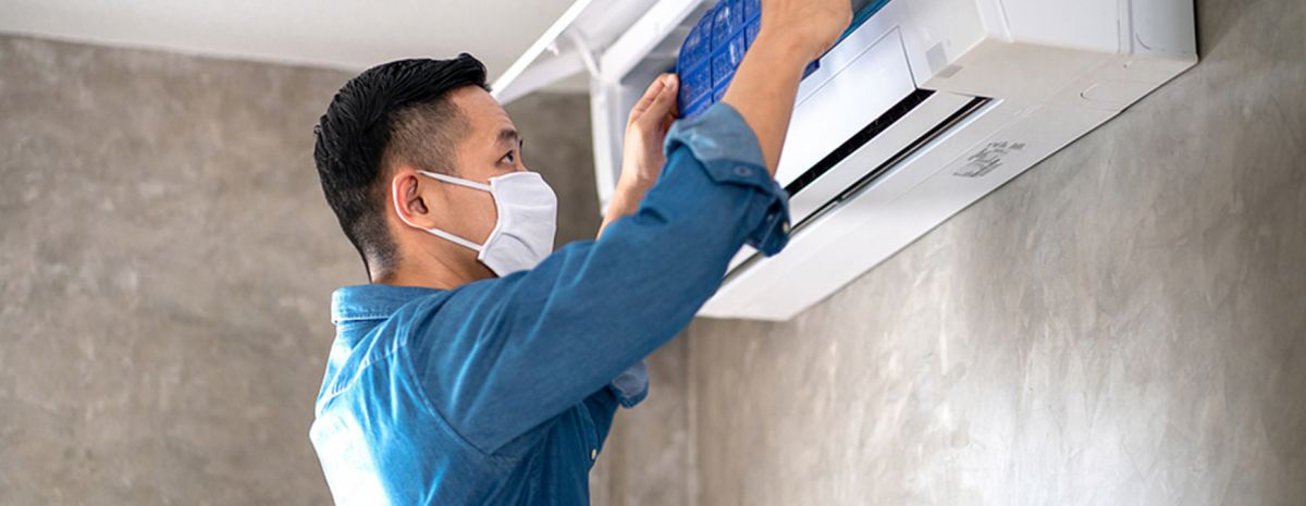 hvac technician wearing face mask