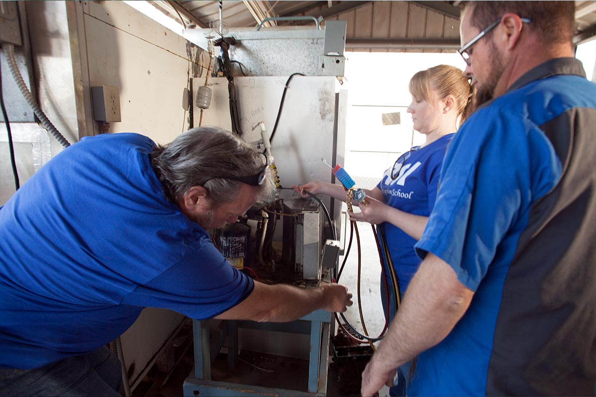 multiple vocational students learning hvac