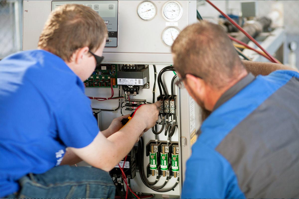 student learning hvac at vocational school