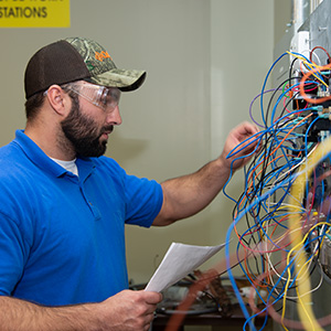 student learning hvac hands on